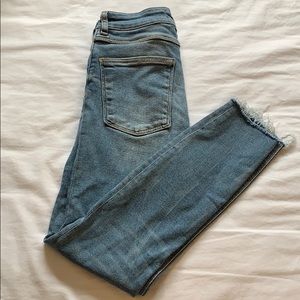 medium wash distressed skinny denim jeans